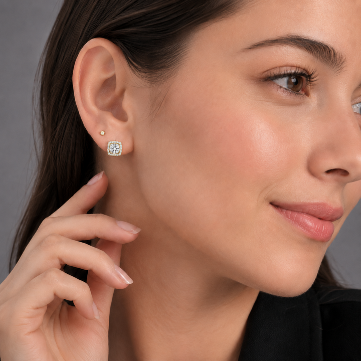 Nadine square earrings in gold worn by model